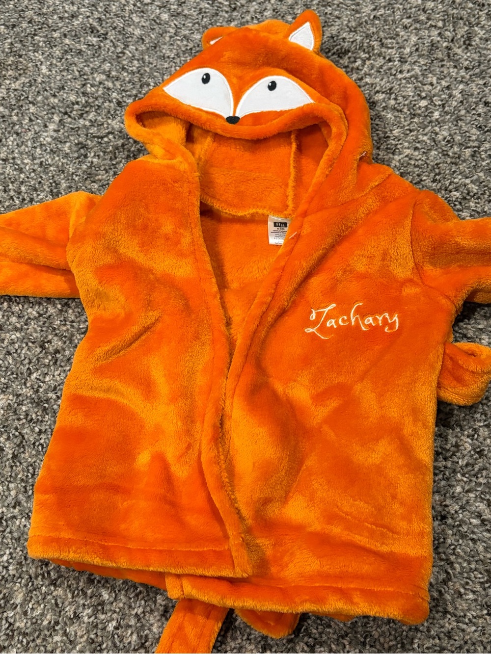Fuzzy orange fox robe with “Zachary” monogram